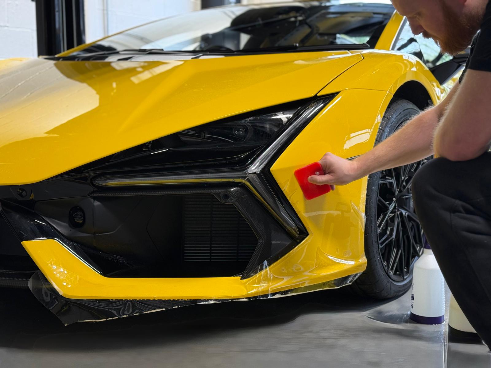 PPF installation on yellow Lamborghini Revuelto
